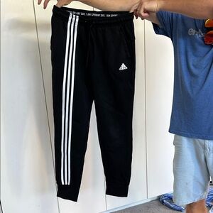 Adidas Women’s Black Sweatpants with White Stripes